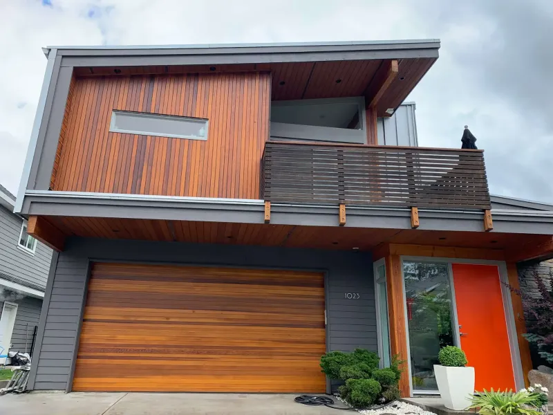 Completed cedar wood restoration in Squamish BC, warm honey-amber Sikkens stain by Colour Craft Painting